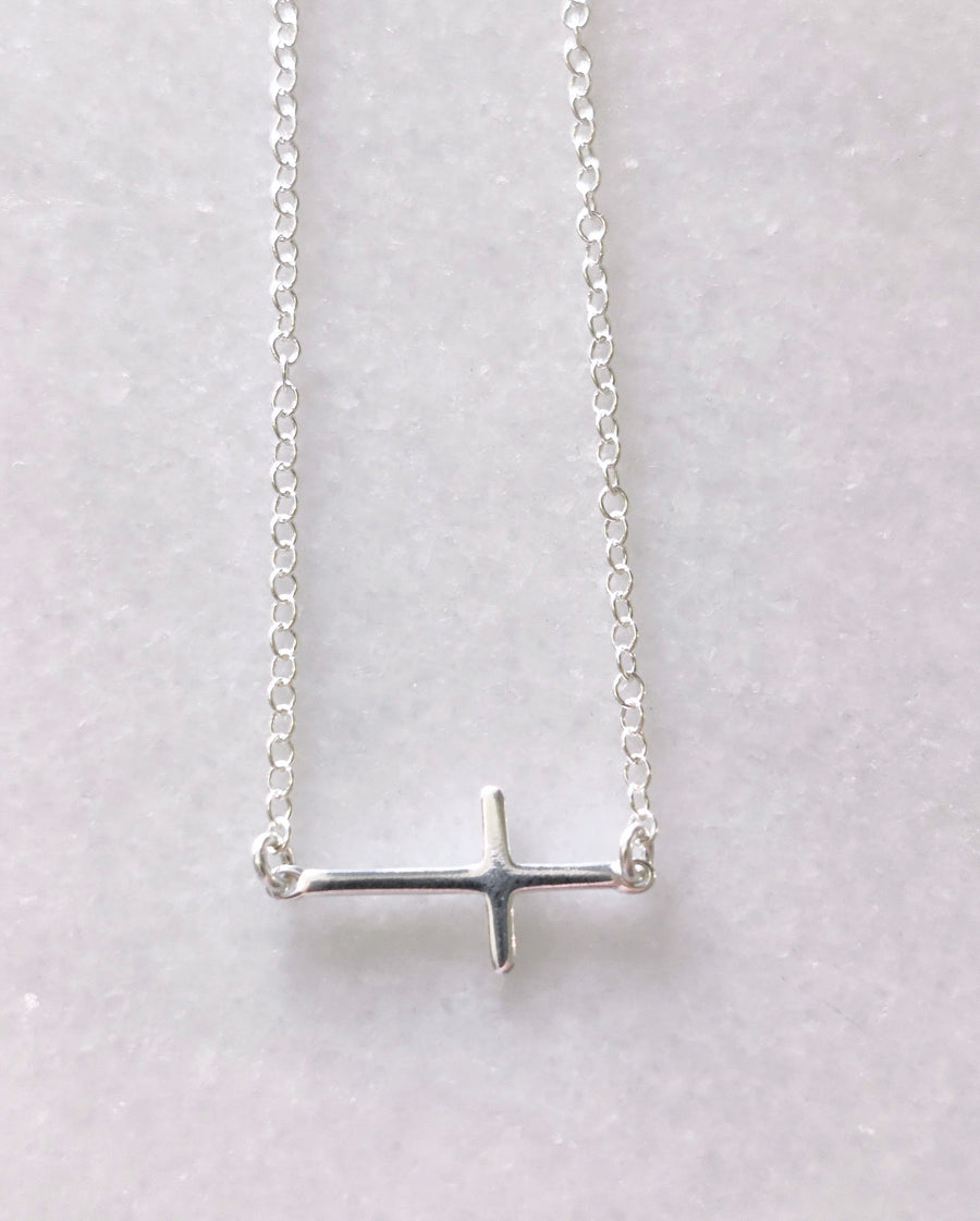 Silver sideways cross necklace