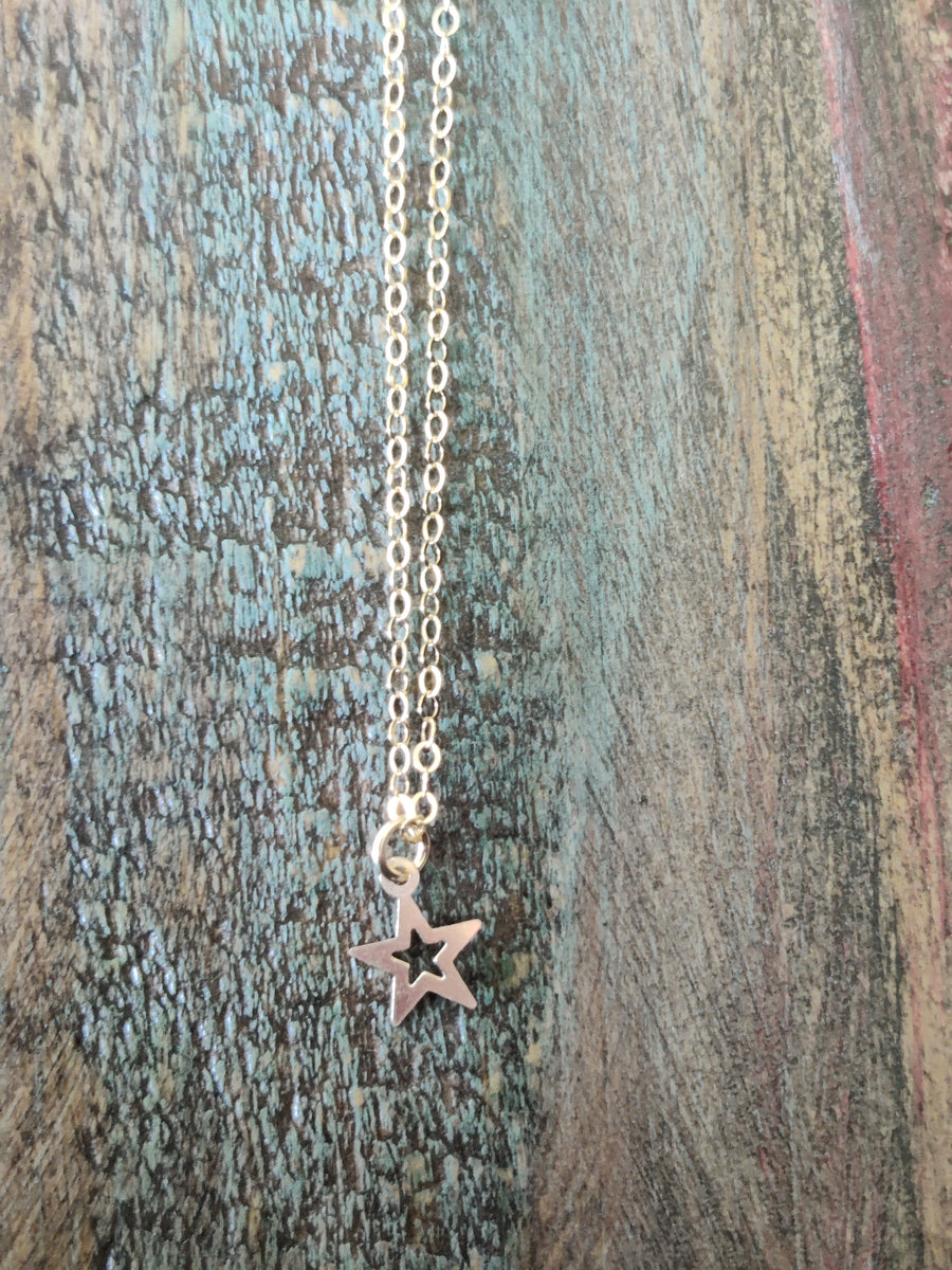 Gold cut out Star Necklace