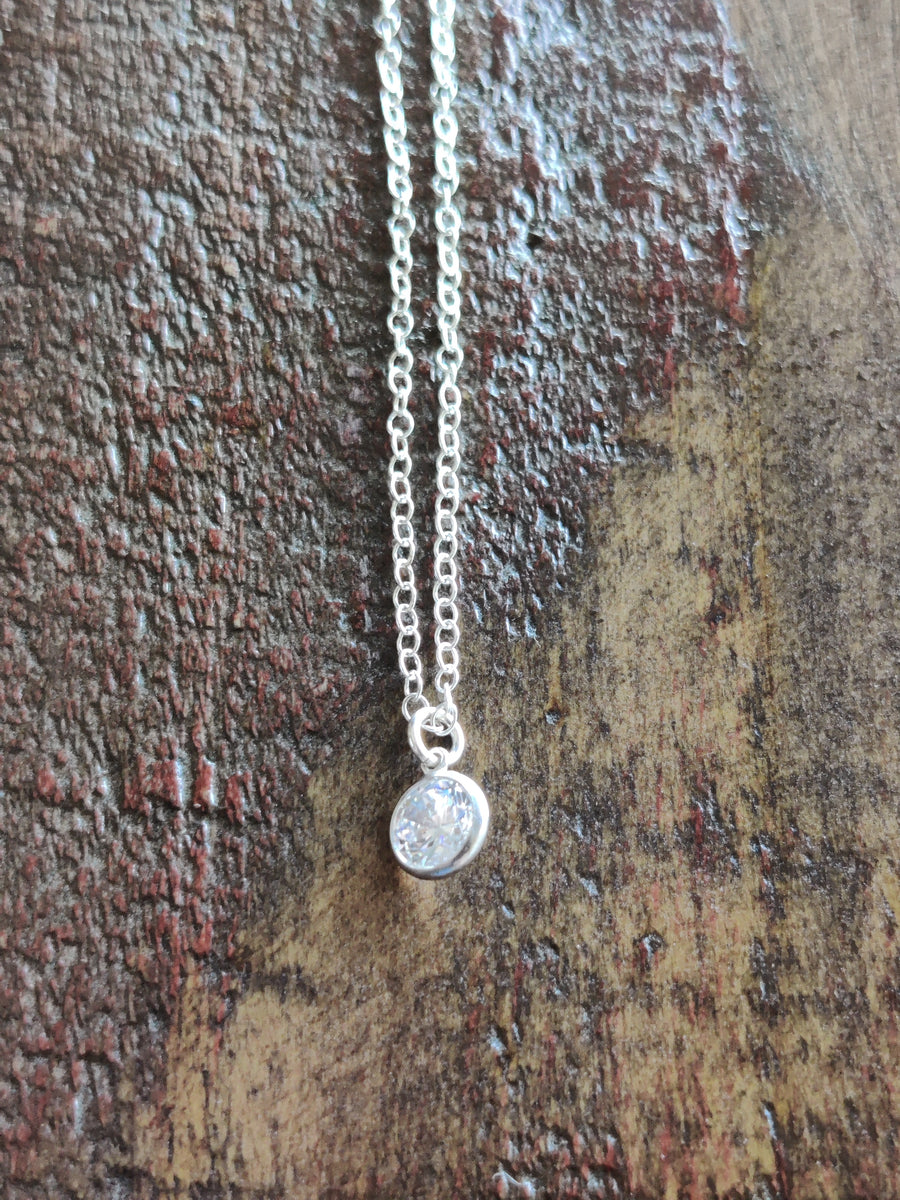 Sterling silver cubic zirconia round pendant necklace