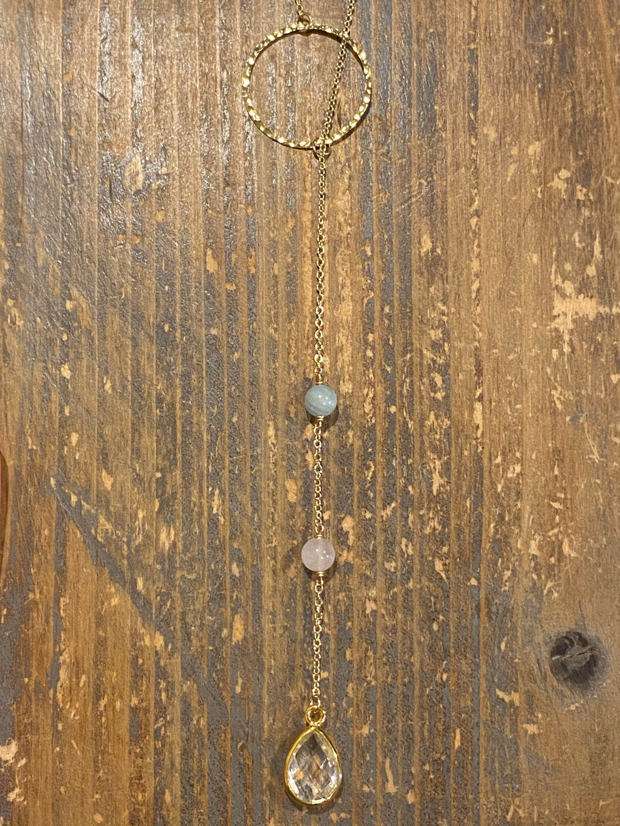 Gold lariat with aquamarine, rose quartz & clear quartz edged in gold drop