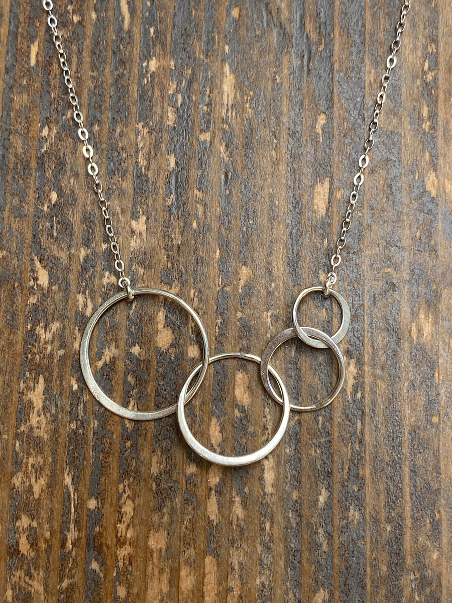 Gold infinity four circle necklace