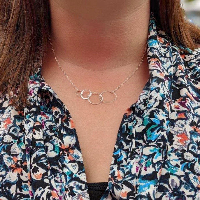 Silver infinity four circle necklace