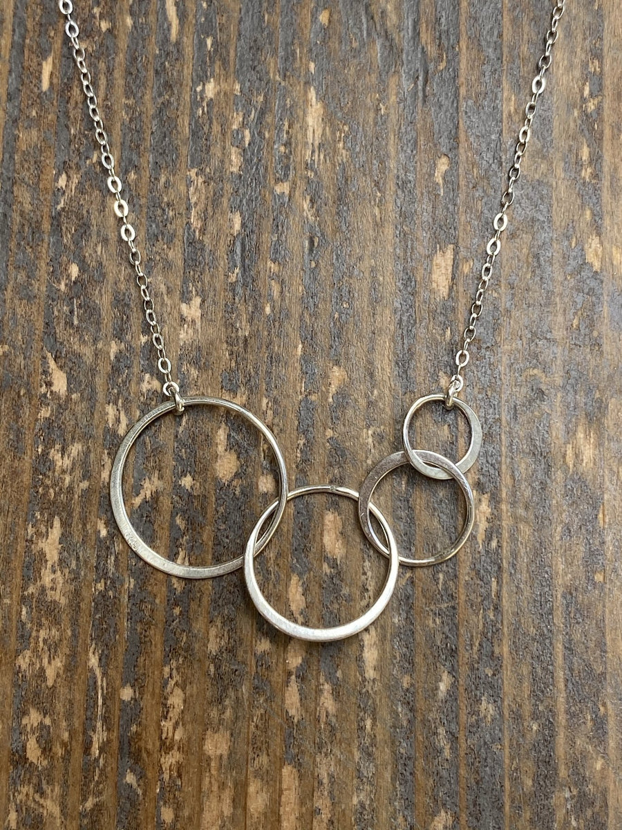 Custom birthstones on gold infinity four circle necklace