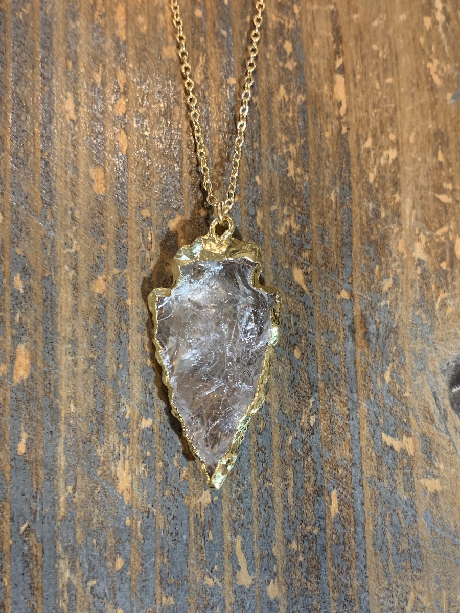 Gold clear quartz arrowhead edged in gold
